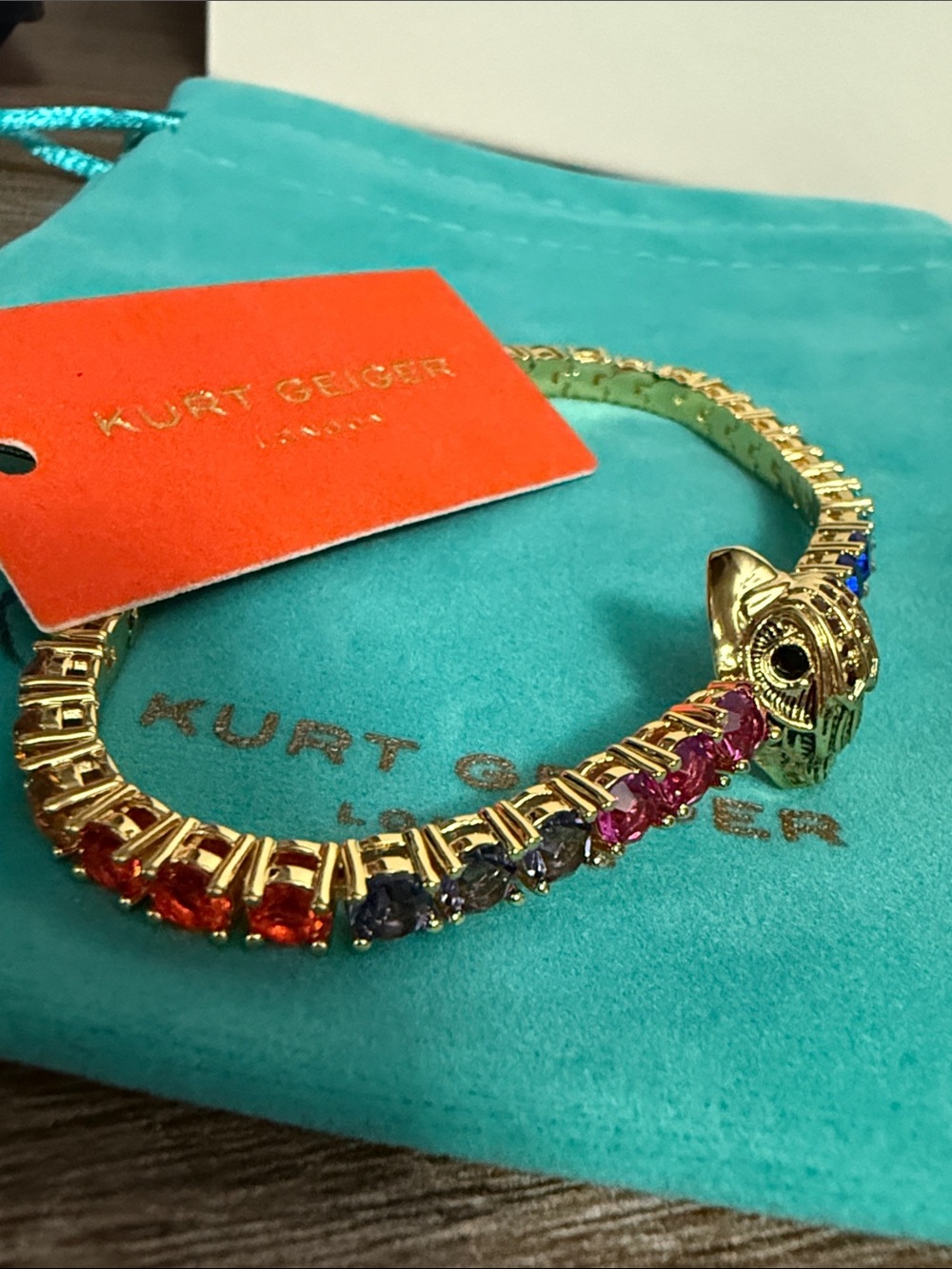Kurt Geiger Gold Bracelet with Blue Accent Stones